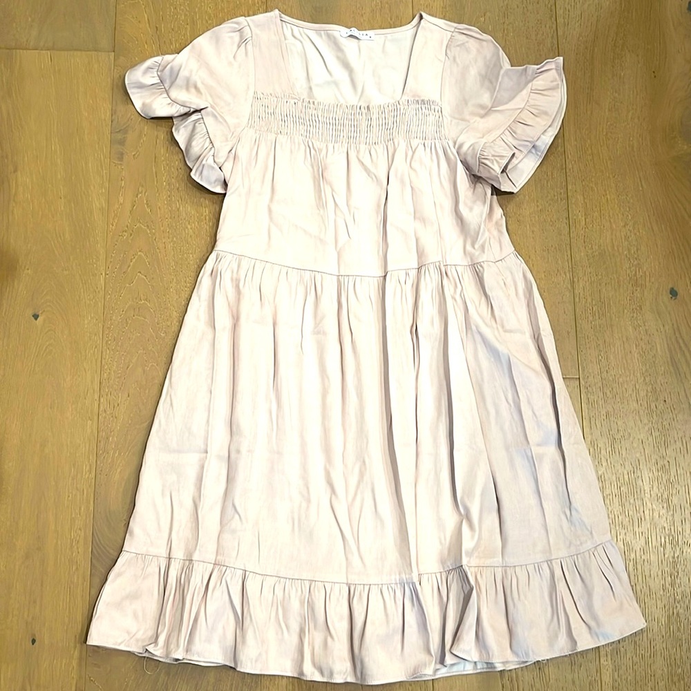 Cream colored ruffled maternity dress